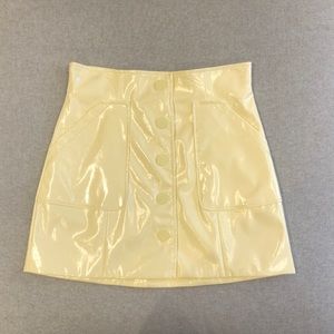 GANNI faux leather skirt in soft yellow